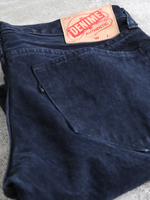 BLACK GARMENT DYE SLIM DENIM PANTS