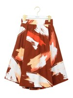 【emmi atelier】ペイントプリントタックスカート/ORG