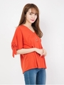 ネックレス付き袖リボントップス/オレンジ