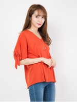 ネックレス付き袖リボントップス/オレンジ
